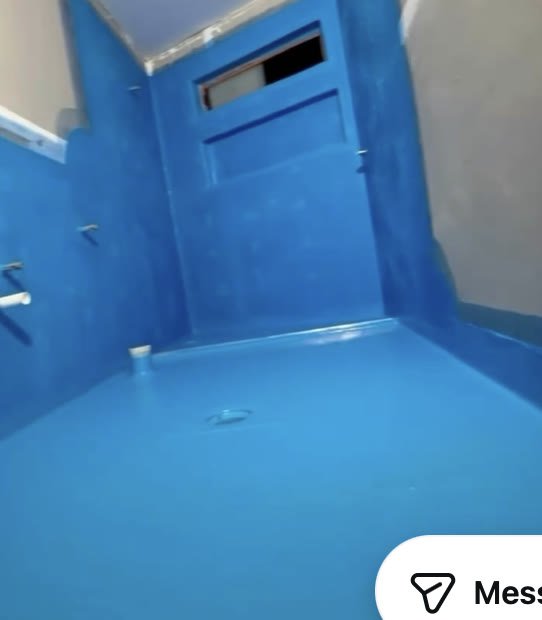 Wet area with full blue membrane coating to floor and walls